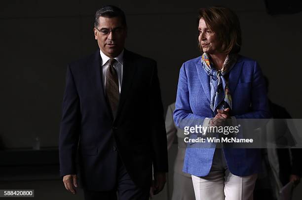 House Democratic Leader Nancy Pelosi arrives with Rep. Xavier Becerra for a press conference at the U.S. Capitol August 11, 2016 in Washington, DC....