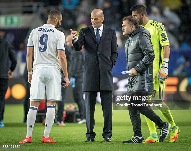 Karim Benzema, Zinedine Zidane,Keeper Coach Luis LLopis, Kika Casilla of Real Madrid during theUEFA Super Cup match between Real Madrid and Sevilla...