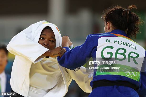 Audrey Tcheumeo of France competes with Natalie Powell of Great Britain during the women's -78kg elimination round judo contest on Day 6 of the 2016...