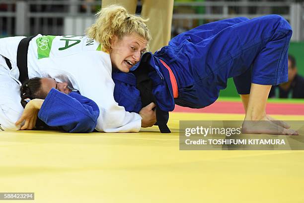 Kayla Harrison competes with Hungary's Abigel Joo during their women's -78kg judo contest quarterfinal match of the Rio 2016 Olympic Games in Rio de...