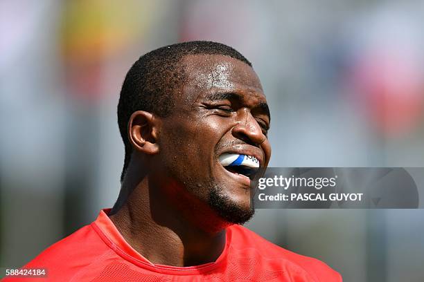 Kenya's Willie Ambaka reacts in the mens rugby sevens match between Brazil and Kenya during the Rio 2016 Olympic Games at Deodoro Stadium in Rio de...