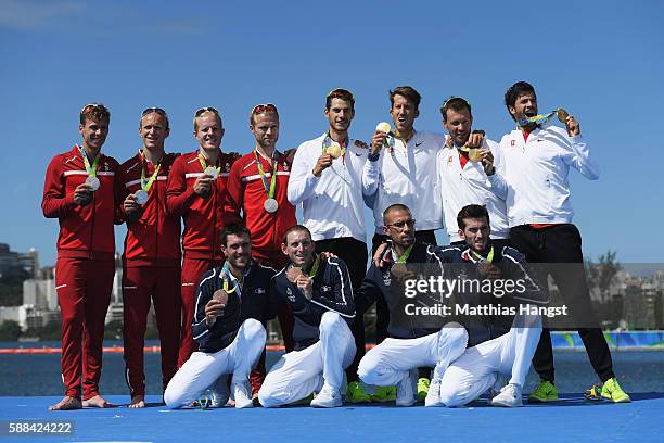 Jacob Barsoe of Denmark, Jacob Larsen of Denmark, Kasper Joergensen of Denmark and Morten Joergensen celebrate winning silver, Lucas Tramer of...