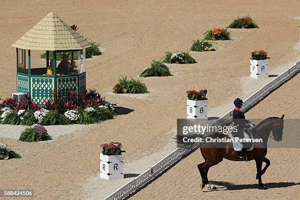 Carl Hester of Great Britain riding Nip Tuck competes in the Mens/Womens Team Dressage Grand Prix event on Day 6 of the Rio 2016 Olympic Games at the...