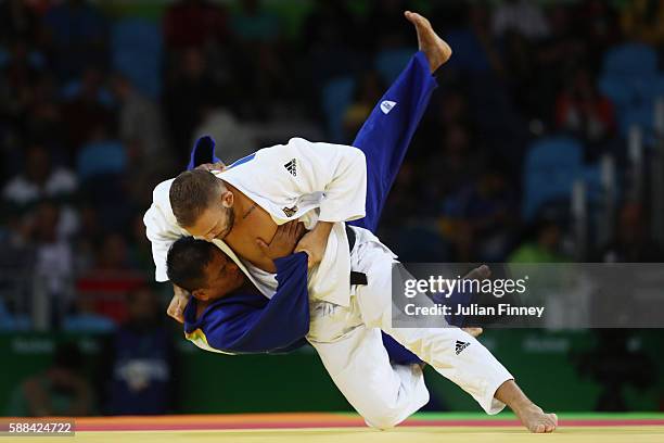 Karl-Richard Frey of Germany competes against Artem Bloshenko of Ukraine during the men's -100kg elimination round judo contest on Day 6 of the 2016...