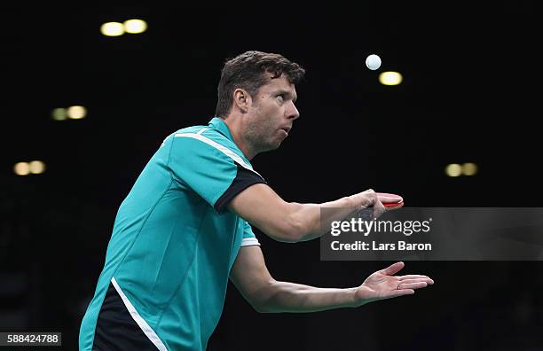 Vladimir Samsonov of Belarus competes during the Mens Table Tennis Singles Semifinal match between Vladimir Samsonov of Belarus and Zhang Jik of...