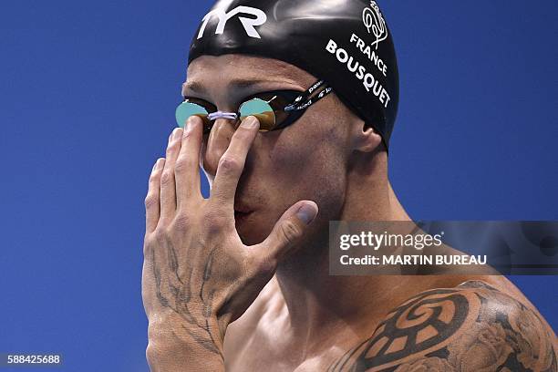 France's Frederick Bousquet prepares to compete in a Men's 50m Freestyle heat during the swimming event at the Rio 2016 Olympic Games at the Olympic...