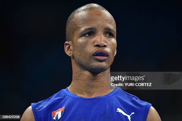 Cuba's Roniel Iglesias looks on as he awaits the results of his fight against Armenia's Vladimir Margaryan during the Men's Welter match at the Rio...
