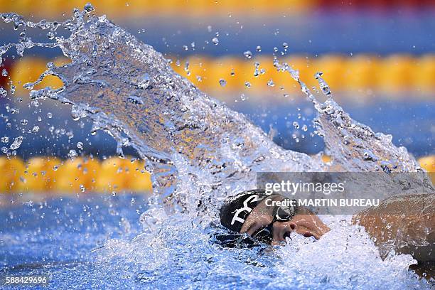 Denmark's Lotte Friis competes in a Women's 800m Freestyle heat during the swimming event at the Rio 2016 Olympic Games at the Olympic Aquatics...