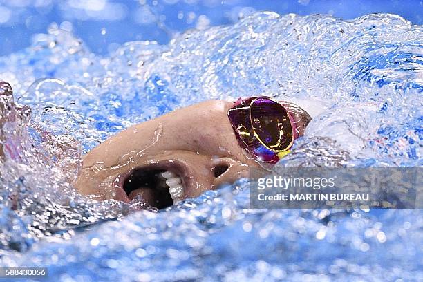China's Zhang Yuhan competes in a Women's 800m Freestyle heat during the swimming event at the Rio 2016 Olympic Games at the Olympic Aquatics Stadium...