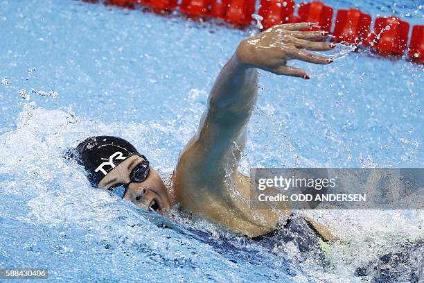 Denmark's Lotte Friis competes in a Women's 800m Freestyle heat during the swimming event at the Rio 2016 Olympic Games at the Olympic Aquatics...