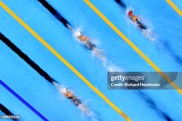 Leah Smith of the United States, Katie Ledecky of the United States and Jazz Carlin of Great Britain compete in the Women's 800m Freestyle heat on...