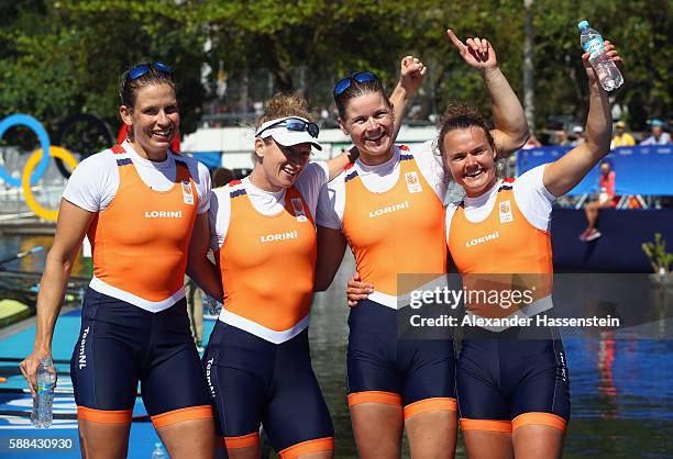 Chantal Achterberg, Nicole Beukers, Inge Janssen, and Carline Bouw of the Netherlands pose after winning the silver medal in the Women's Quadruple...