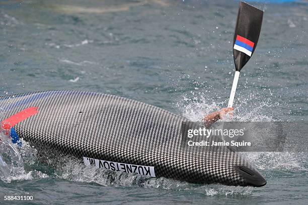 Mikhail Kuznetsov and Dmitry Larionov of Russia react during the Men's Canoe Double Final on Day 6 of the Rio 2016 Olympics at Whitewater Stadium on...