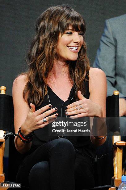 Devin Kelley speaks onstage at the 'Frequency' panel discussion during the CW portion of the 2016 Television Critics Association Summer Tour at The...