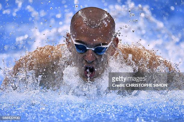 Hungary's Laszlo Cseh competes in a Men's 100m Butterfly heat during the swimming event at the Rio 2016 Olympic Games at the Olympic Aquatics Stadium...