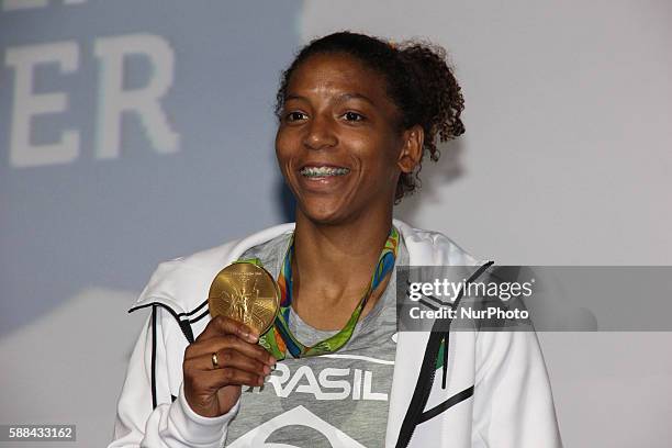 Rio 2016 Olympic Games women's -57kg judo gold medal winner Rafaela Silva is seen during a press conference about racism in Rio de Janeiro on August...