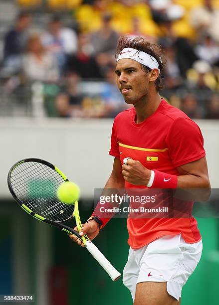 Rafael Nadal of Spain celebrates match point during the men's singles third round match against Gilles Simon of France on Day 6 of the 2016 Rio...