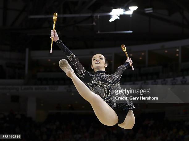 Natalia Azevedo Gaudio of Brazil performs her routine in the clubs competition in rhythmic gymnastics at the Toronto 2015 PanAm Games in Toronto,...