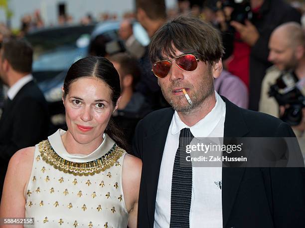 Alex James and Claire Neate arriving at the GQ Men of the Year Awards at the Royal Opera House in London