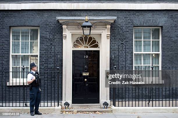 Policeman guards number 10 Downing Street in London.