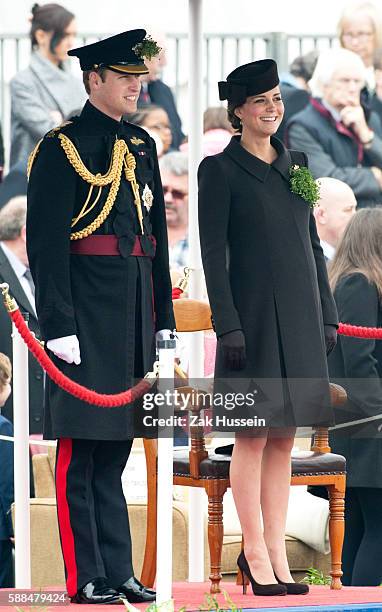 Prince William, Duke of Cambridge and Catherine, Duchess of Cambridge, wearing a bespoke Catherine Walker coat, attending the Irish Guards' St....