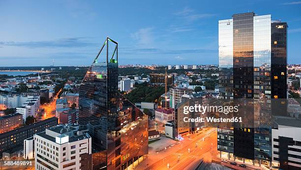 estonia, tallinn, cityview in the evening - estland stock-fotos und bilder