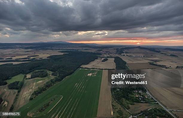 germany, aerial view of nothern harz foreland at evening twilight - saxe anhalt photos et images de collection