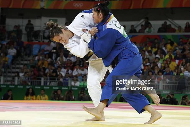 Hungary's Abigel Joo competes with Cuba's Yalennis Castillo during their women's -78kg judo contest repechage match of the Rio 2016 Olympic Games in...