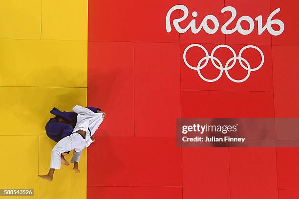 Karl-Richard Frey of Germany competes with Ramadan Darwish of Egypt during the men's -100kg repechage judo contest on Day 6 of the 2016 Rio Olympics...