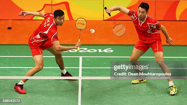 Chai Biao and Hong Wei of China compete against Kenichi Hayakawa Hiroyuki Endo of Japan in the badminton Mens Doubles on Day 6 of the 2016 Rio...