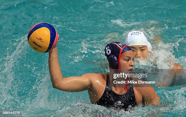 Kiley Neushul of United States passes during a Womens Preliminary match against China on Day 6 of the 2016 Rio Olympics at Maria Lenk Aquatics Centre...