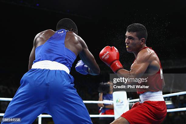 Rayton Nduku Okwiri of Kenya fights Mohammed Rabii of Morocco in their Mens Welterweight bout on Day 6 of the 2016 Rio Olympics at Riocentro -...