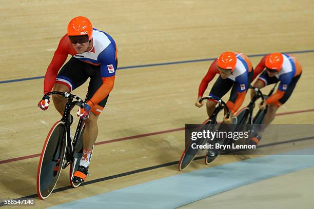 Jeffrey Hoogland, Theo Bos and Matthijs Buchli of Netherlands compete in the Men's Team Sprint Track Cycling Qualifying on Day 6 of the 2016 Rio...
