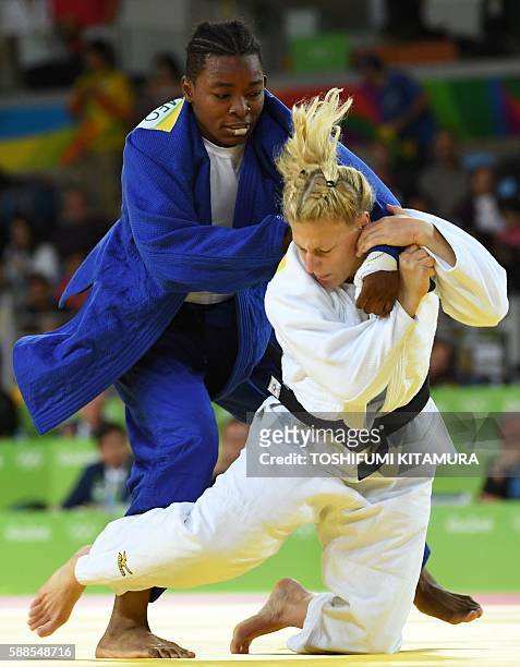 France's Audrey Tcheumeo competes with US Kayla Harrison during their women's -78kg judo contest gold medal match of the Rio 2016 Olympic Games in...
