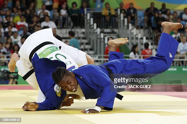 France's Audrey Tcheumeo competes with US Kayla Harrison during their women's -78kg judo contest gold medal match of the Rio 2016 Olympic Games in...