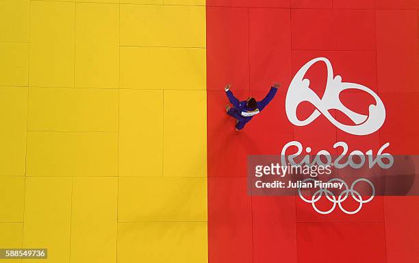 Cyrille Maret of France celebrates after winning the men's -100kg bronze medal judo contest against Karl-Richard Frey of Germany on Day 6 of the 2016...
