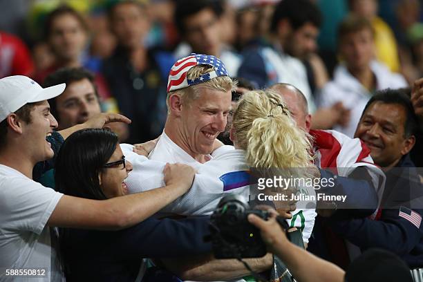 Kayla Harrison of the United States celebrates after defeating Audrey Tcheumeo of France during the women's -78kg gold medal judo contest on Day 6 of...
