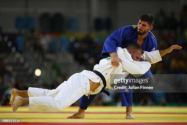 Cyrille Maret of France competes with Karl-Richard Frey of Germany during the men's -100kg bronze medal judo contest on Day 6 of the 2016 Rio...