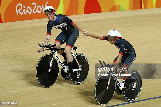 Elinor Barker and Joanna Rowsell-Shand of Great Britain celebrate a world record in the Women's Team Pursuit Track Cycling Qualifying on Day 6 of the...