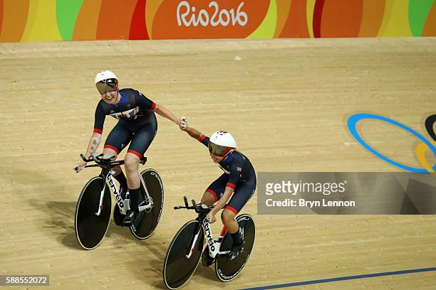 Elinor Barker and Joanna Rowsell-Shand of Great Britain celebrate a world record in the Women's Team Pursuit Track Cycling Qualifying on Day 6 of the...