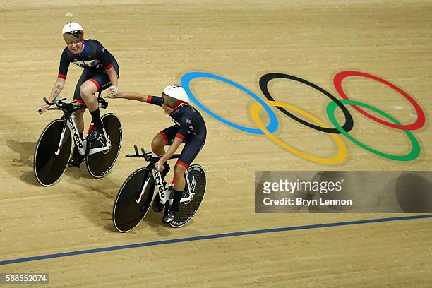 Elinor Barker and Joanna Rowsell-Shand of Great Britain celebrate a world record in the Women's Team Pursuit Track Cycling Qualifying on Day 6 of the...