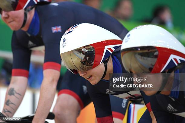 Britain's Elinor Barker, Britain's Katie Archibald and Britain's Joanna Rowsell-Shand compete in the women's Team Pursuit qualifying track cycling...