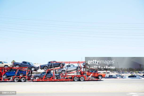 car transporter full of cars in usa - transportation truck stock pictures, royalty-free photos & images