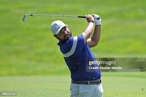 Spaun hits his second shot on the ninth hole during the first round of the Web.com Tour Price Cutter Charity Championship presented by Dr Pepper at...