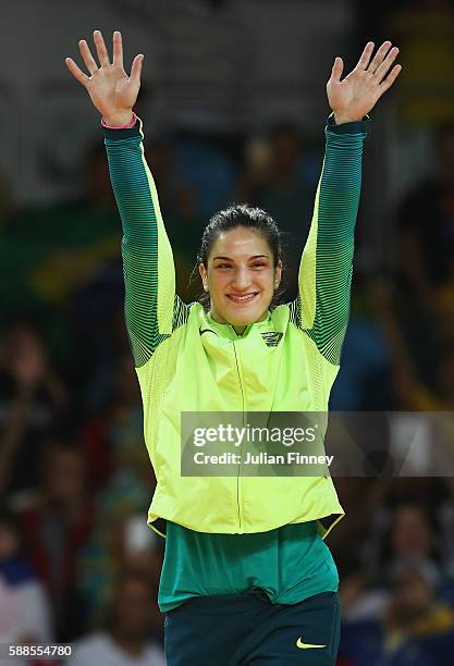 Bronze medalist, Mayra Aguiar of Brazil celebrates on the podium after the women's -78kg bronze medal judo contest against Yalennis Castillo of Cuba...