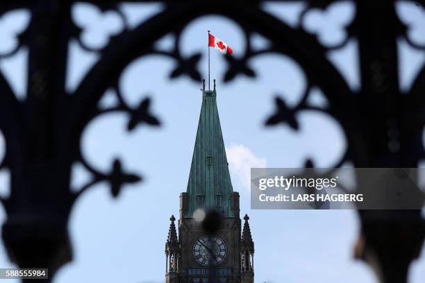 Parliament Hill in Ottawa, Ontario,Canada is seen August 11, 2016. - A Canadian man who had pledged allegiance to the Islamic State group in a video...