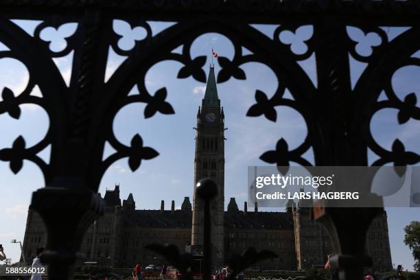 Parliament Hill in Ottawa, Ontario,Canada is seen August 11, 2016. - A Canadian man who had pledged allegiance to the Islamic State group in a video...