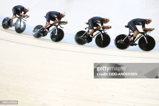 Britain's Edward Clancy, Steven Burke, Owain Doull and Bradley Wiggins compete in the men's Team Pursuit qualifying track cycling event at the...