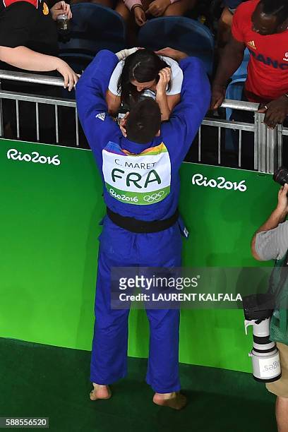 France's Cyrille Maret celebrates after defeating Germany's Karl-Richard Frey during their men's -100kg judo contest bronze medal A match of the Rio...