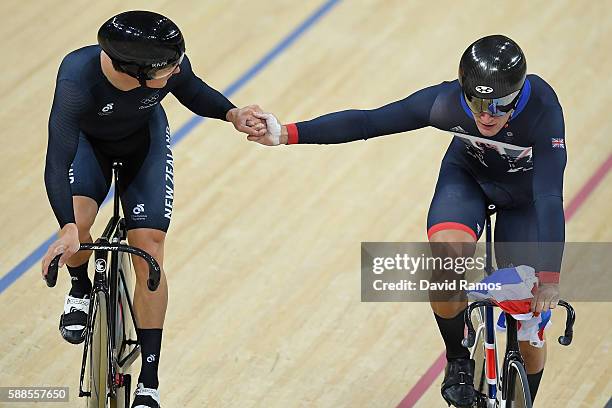 Edward Dawkins of New Zealand congratules Philip Hindes of Great Britain after Team GB wins gold and get an Olympic record in the Men's Team Sprint...